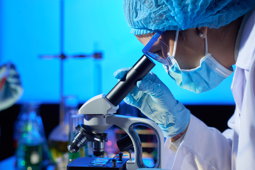 fiendly doctor hands holding patient hand in hospital room